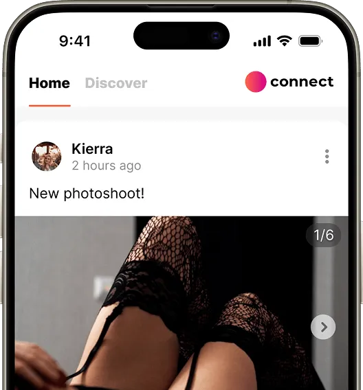 A smartphone displaying a photo of a woman wearing stockings, highlighting her legs and stylish outfit.